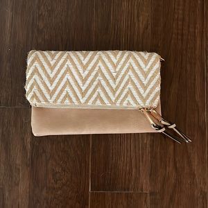 tan and cream clutch